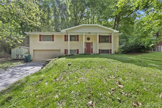 First-time home buyer holding house keys